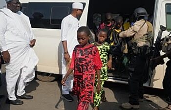 Freed students of St. Mary's Catholic School in the Papiri community arrive at the government house, in Minna, Nigeria, Monday, Dec. 22, 2025. (AP Photo/Sunday Alamba) Copyright 2025 The Associated Press.
